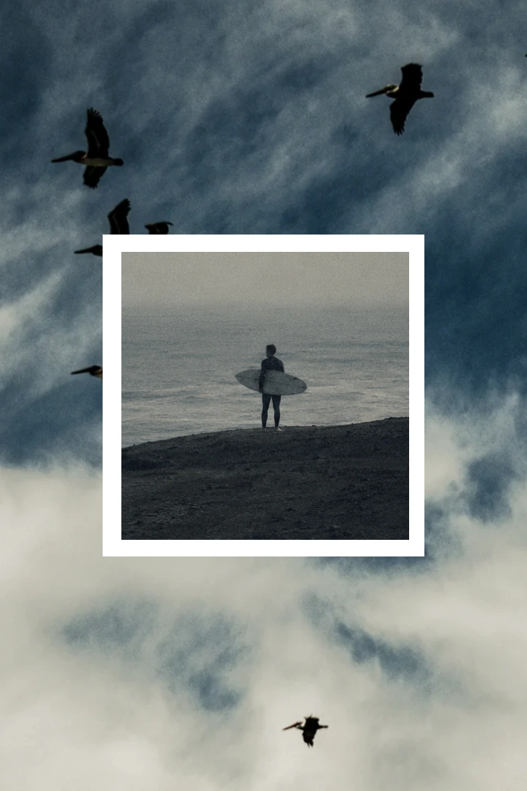 Surfer on the shoreline